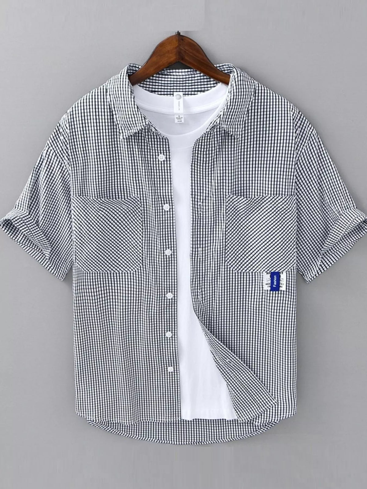 Navy and white plaid short-sleeve cotton button-up shirt with chest pockets