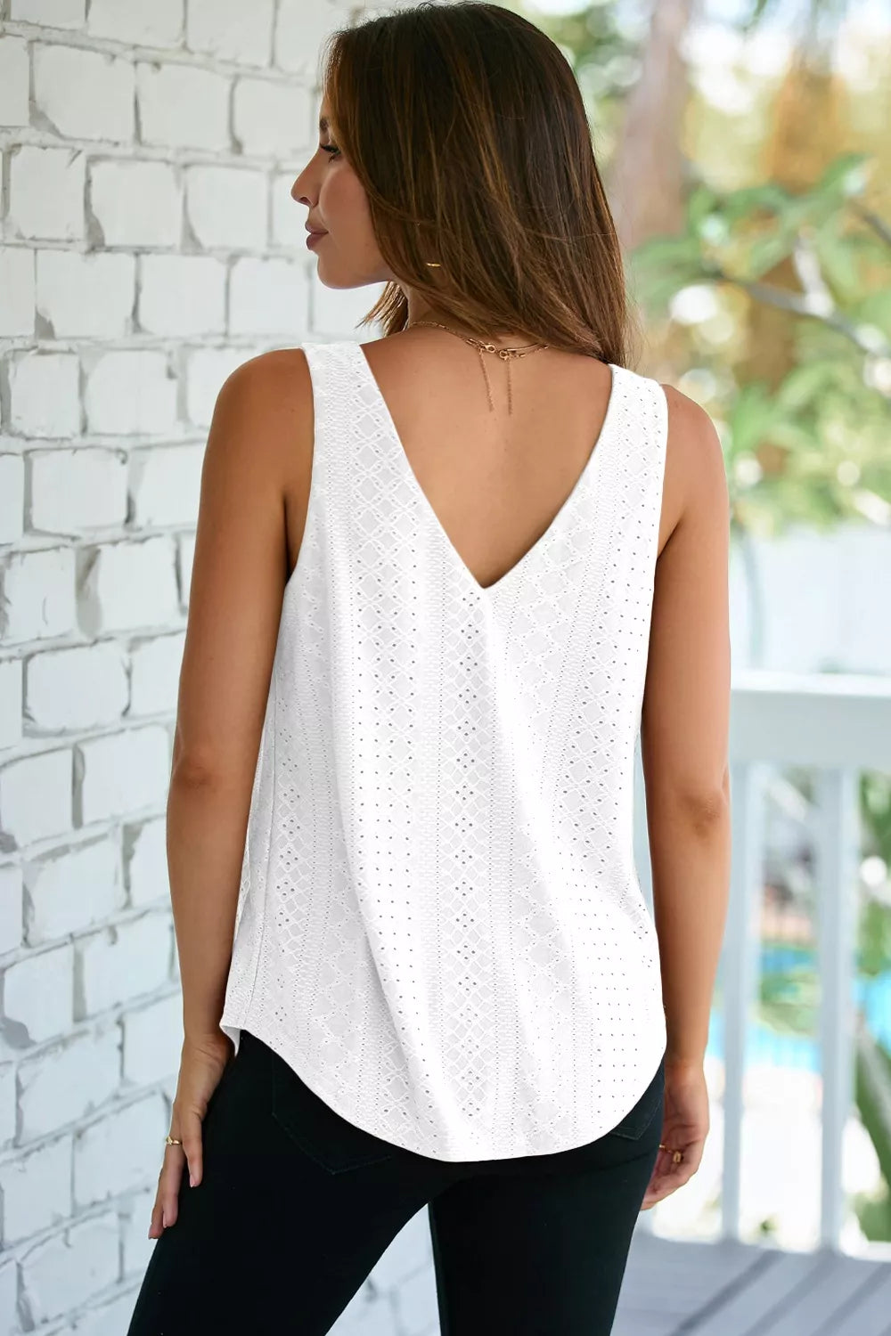 White eyelet knit loose tank top with V-back neckline and patterned front