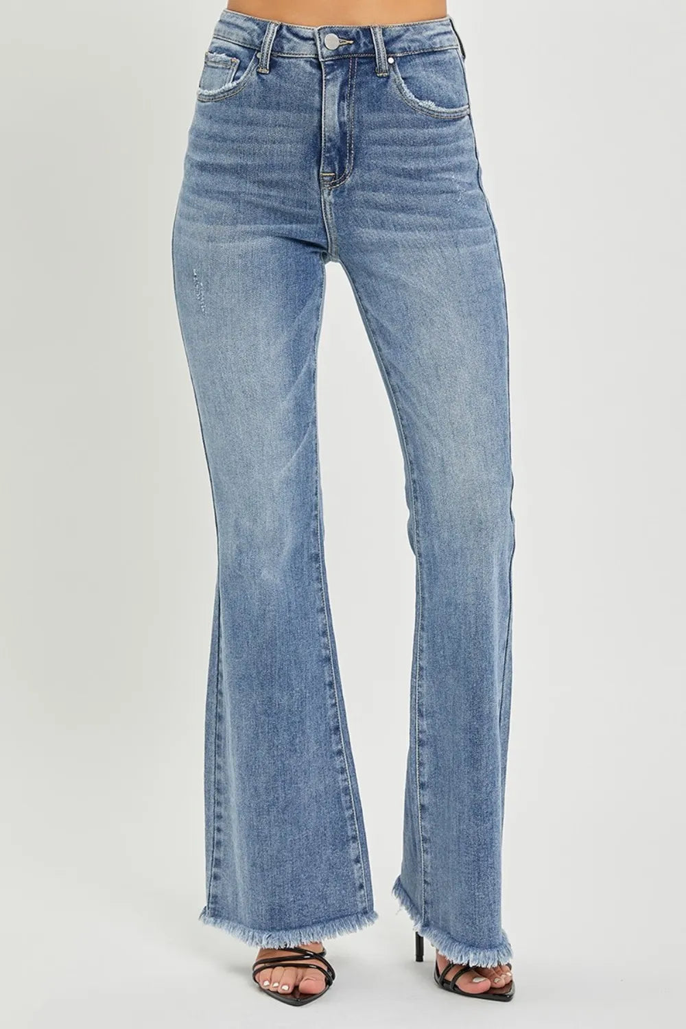 High-waist flare jeans, medium blue wash, front pockets, raw hem