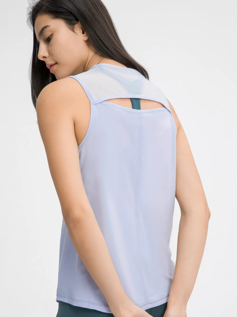 Light blue active tank top back cutout with crisscross strap detail
