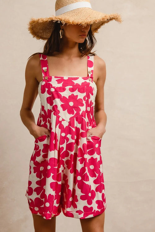 Fuchsia floral short overall with square neckline and wide straps, side pockets