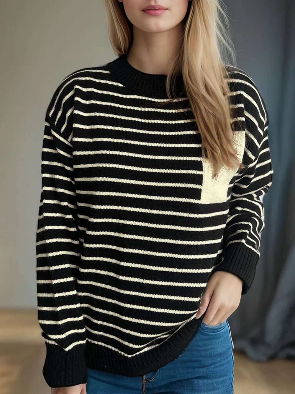 Striped mock neck long-sleeve sweater with black base and cream horizontal stripes