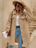 Tan collared button-down coat with sherpa texture, front buttons, and two chest flap pockets