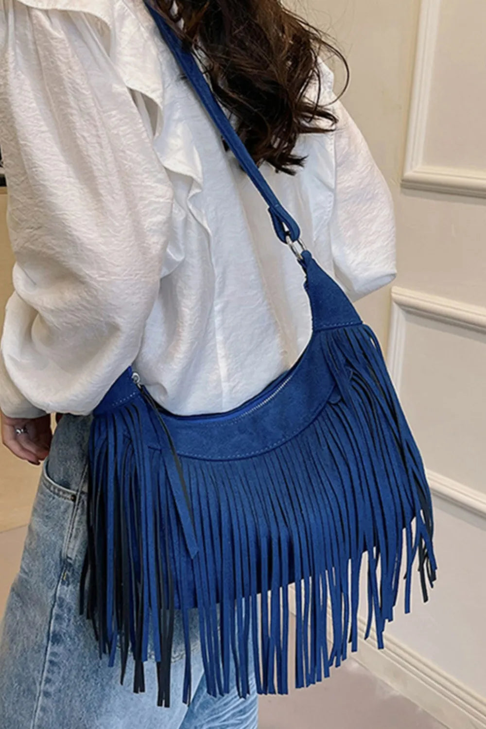 Blue suede fringe shoulder bag with long tassels and adjustable strap