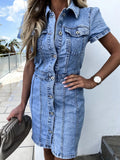 Medium-wash denim button-front short-sleeve dress with collar and chest flap pockets