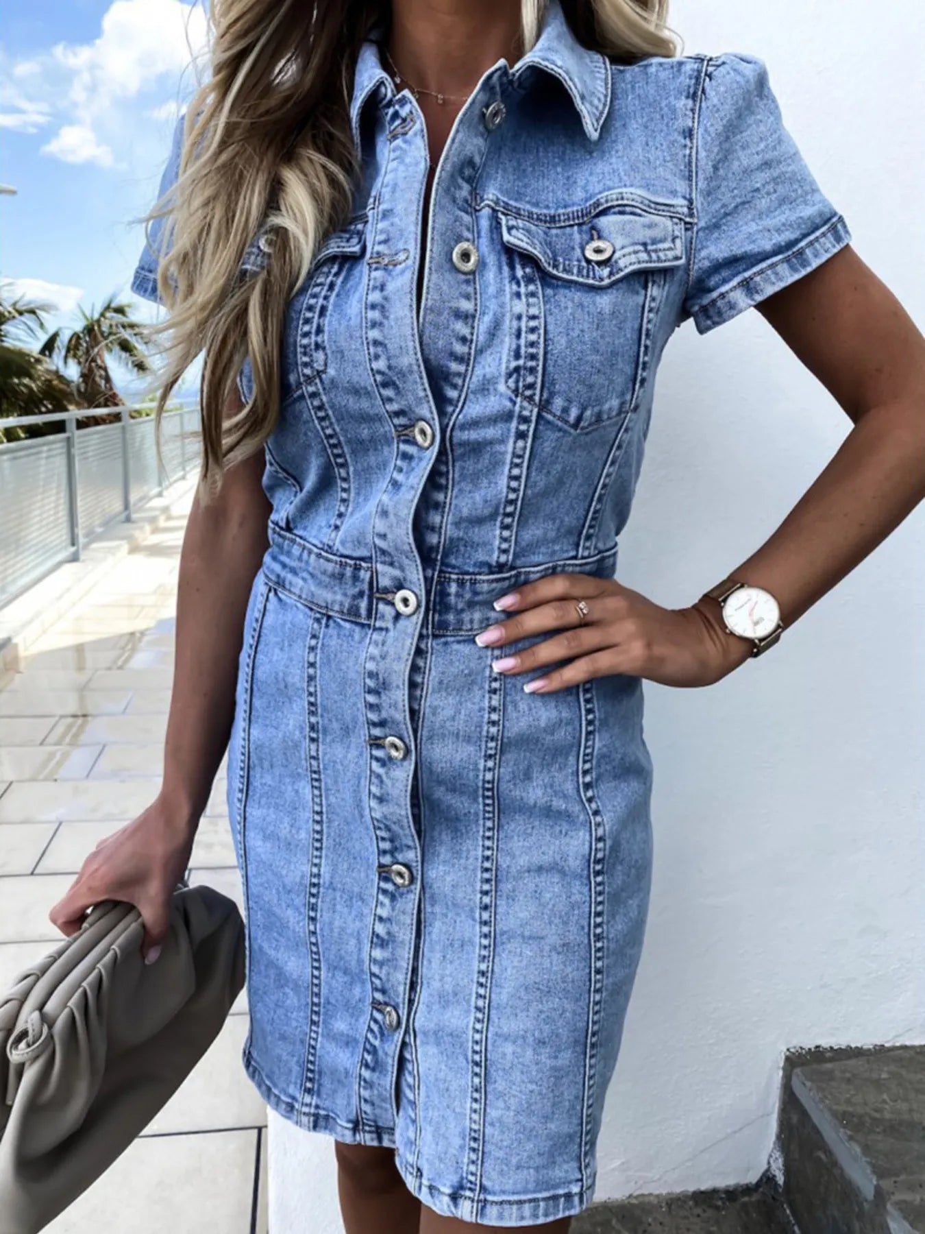 Medium-wash denim button-front short-sleeve dress with collar and chest flap pockets