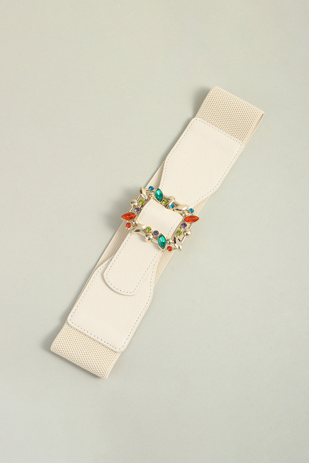 Ivory elastic belt with multicolor leaf buckle on textured wide strap