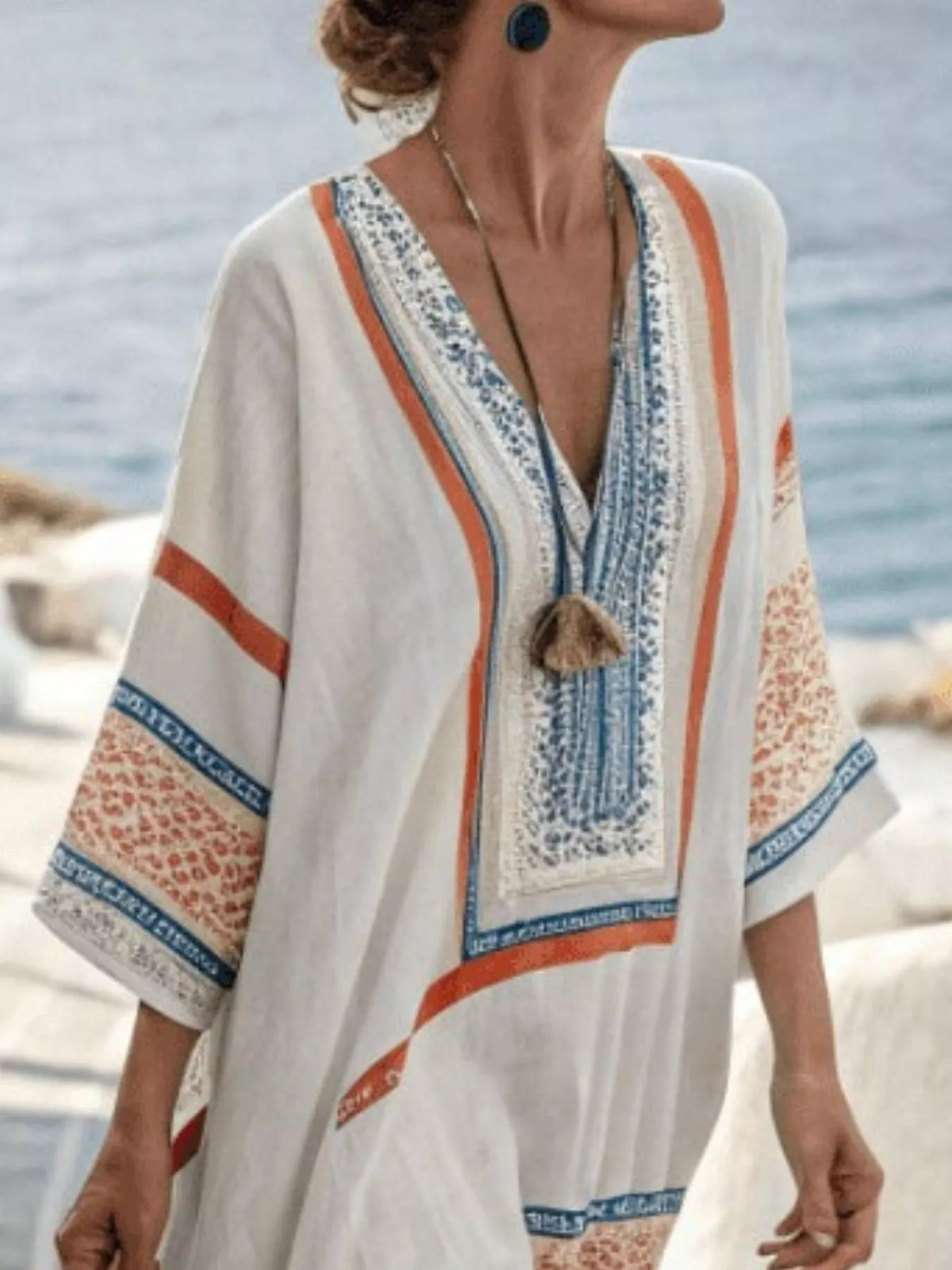 White V-neck maxi dress with multicolor border print and tassel tie, loose 3/4 sleeves