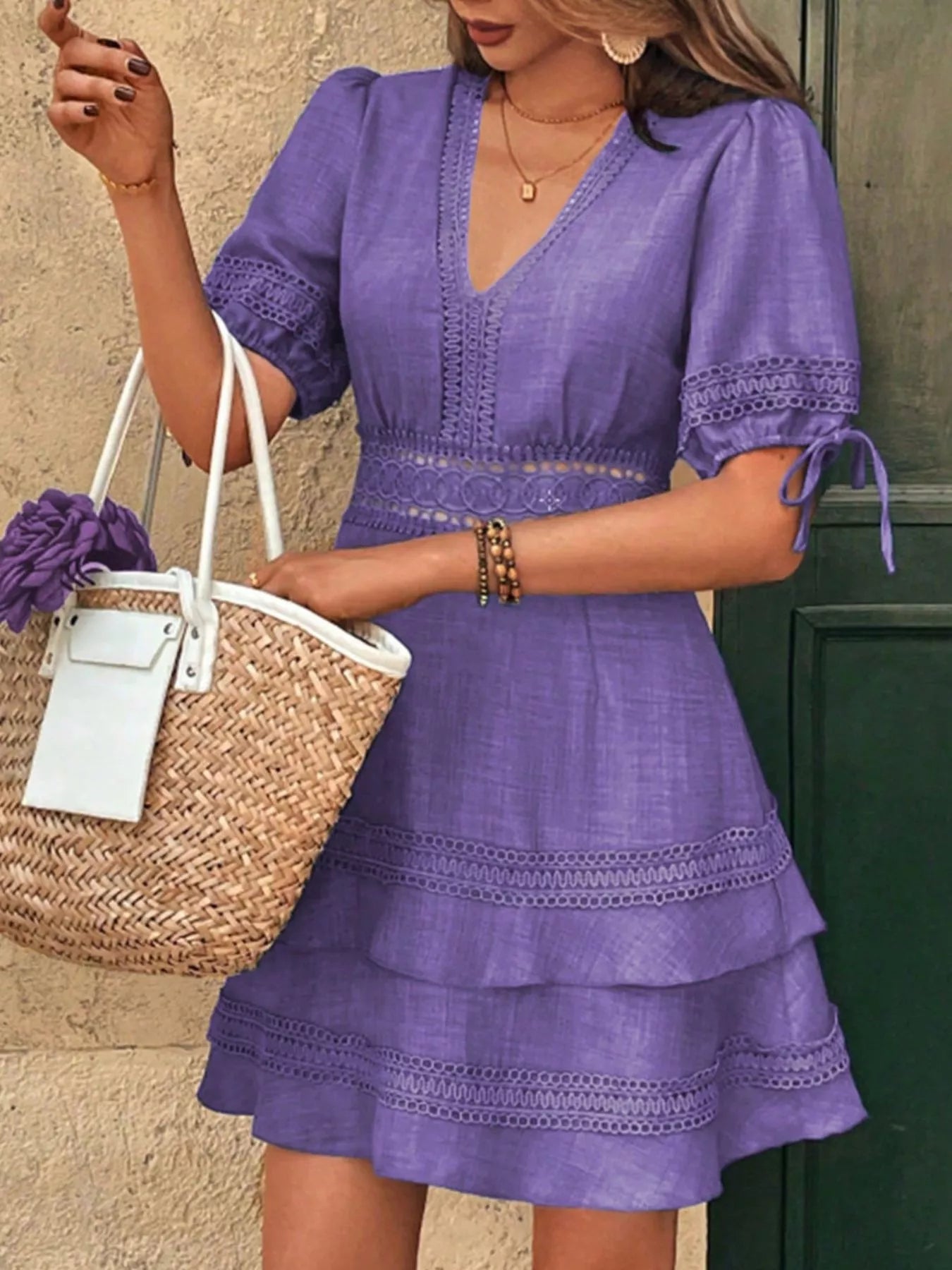 Purple V-neck mini dress with lace trim tiered skirt and ribbon tie sleeves