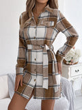 Brown plaid belted button shirt dress with chest pockets, long sleeves, and waist tie