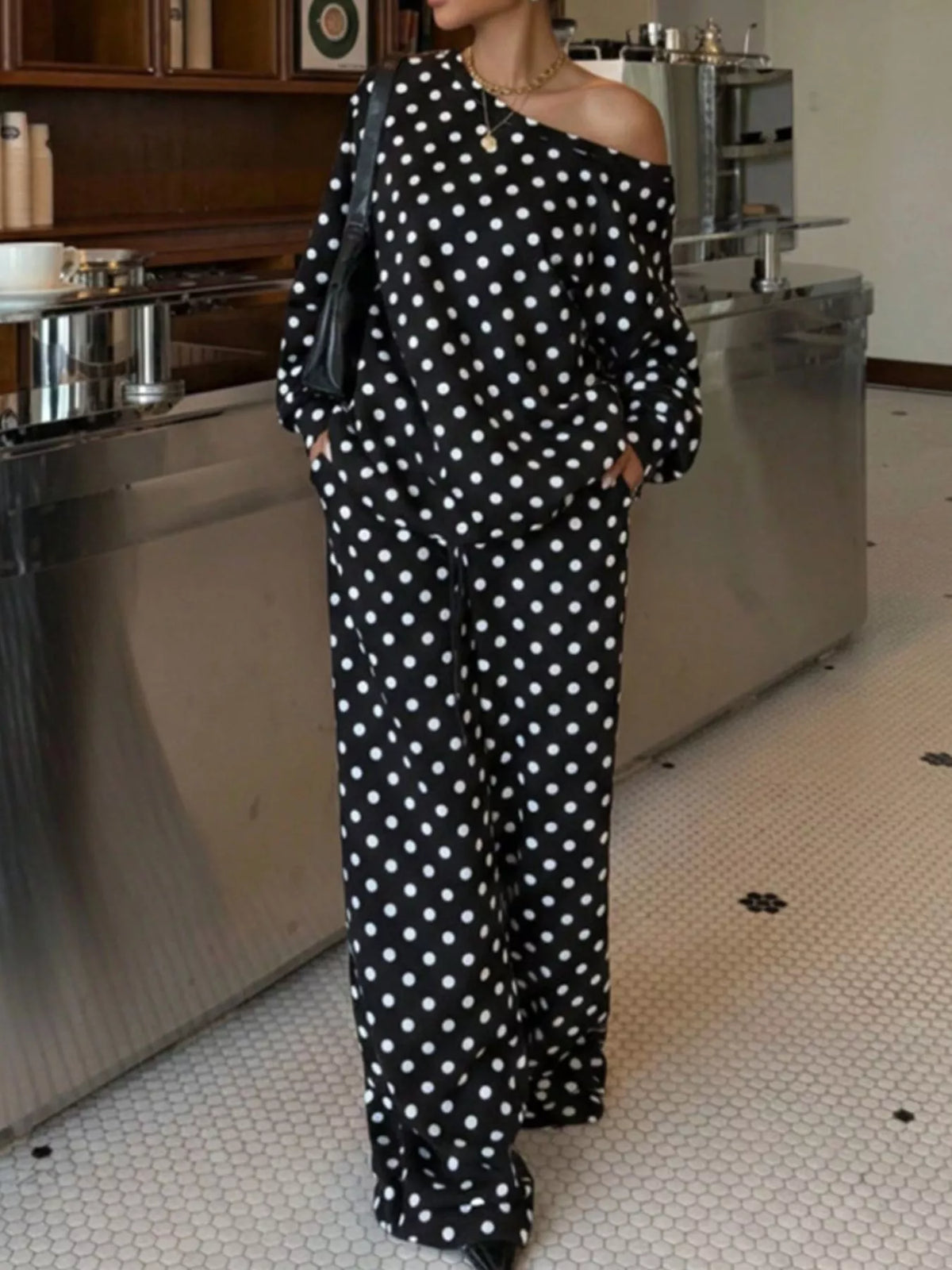 Oversized black polka dot long-sleeve top and matching wide-leg pants set