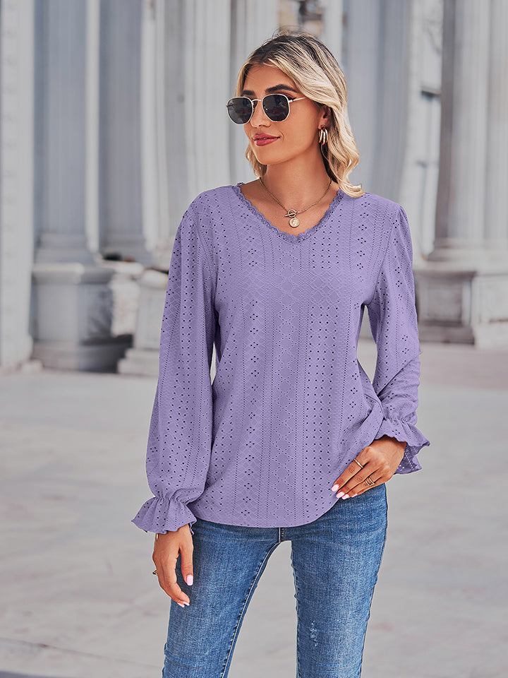 Lavender eyelet V-neck blouse with flounce sleeves and gathered cuffs, front view