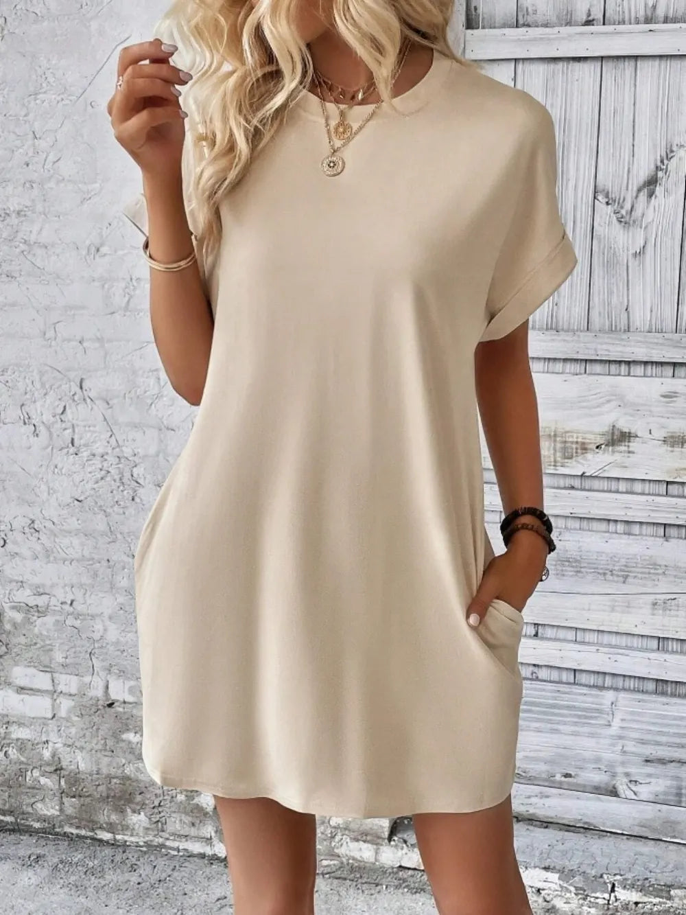 Cream round-neck short-sleeve dress with relaxed A-line shape