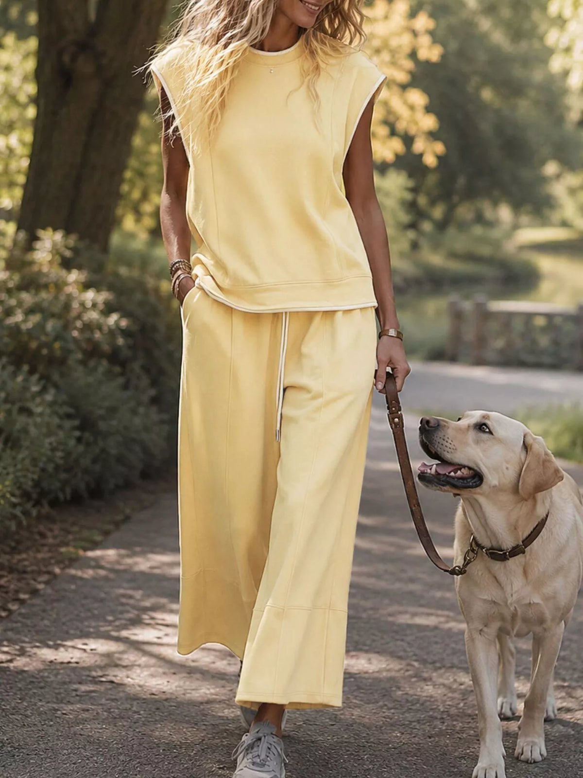 Light yellow sleeveless crew neck top with wide-leg crop pants set, ankle length
