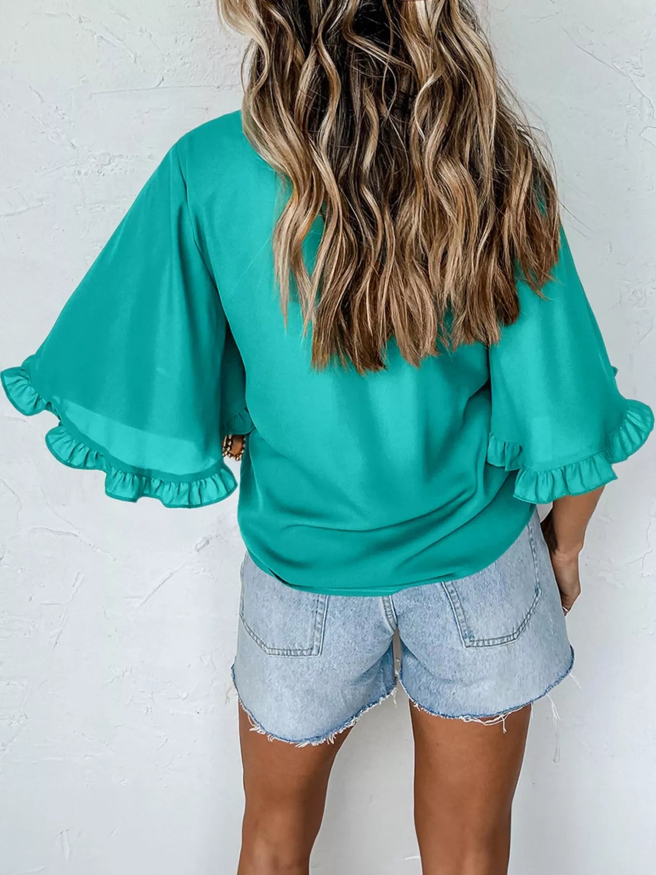 Teal ruffle-trim half-sleeve blouse by Trendsi for a chic spring look
