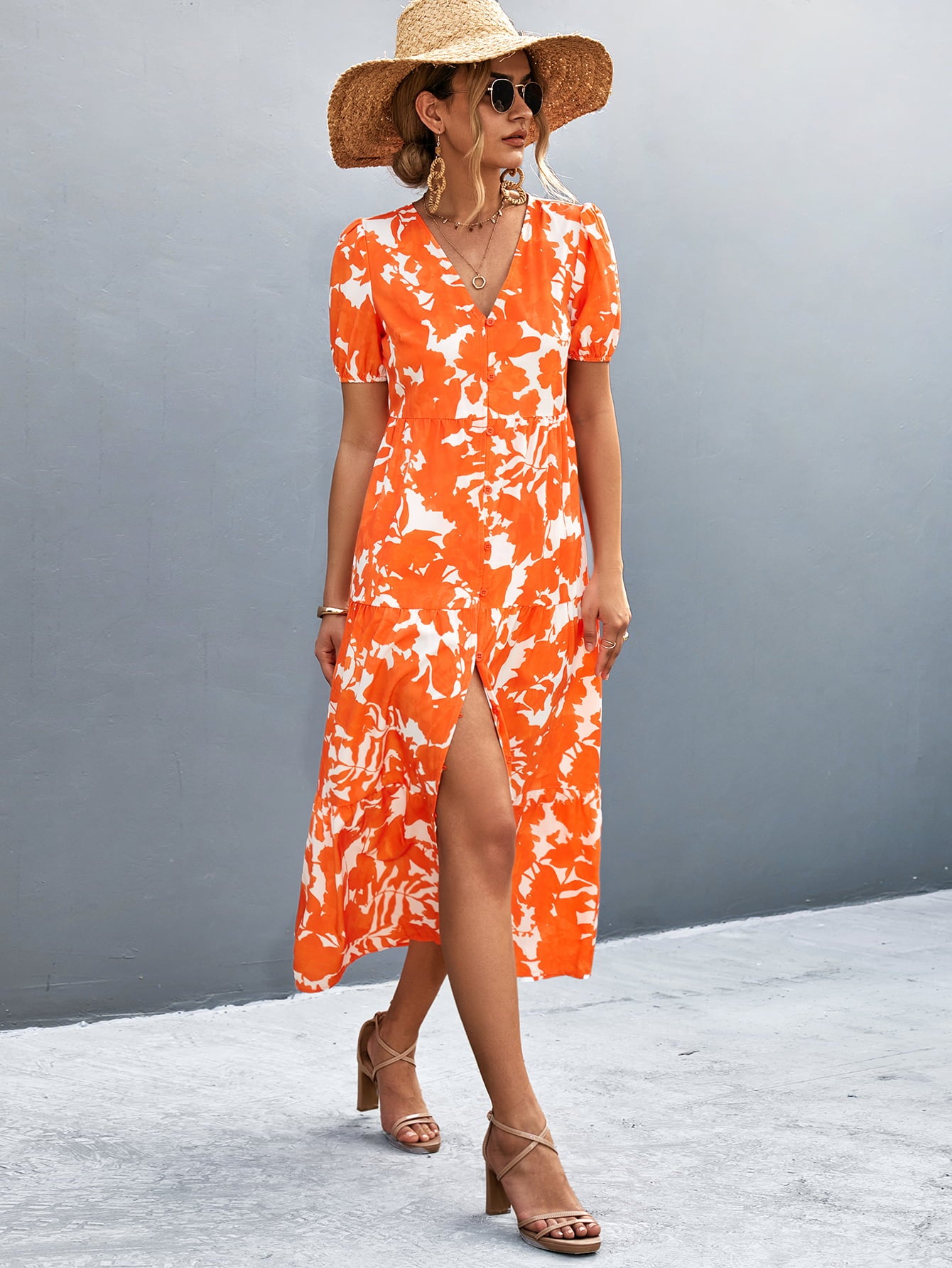 Orange-red V-neck short sleeve midi dress with high slit and white floral print, belted