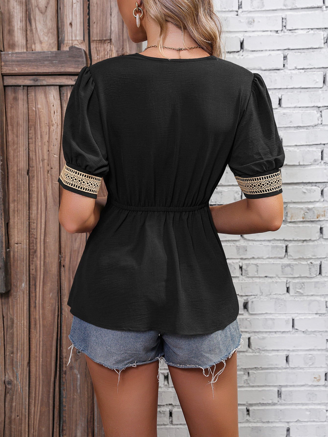 Black contrast V-neck babydoll top, gathered waist, short puff sleeves