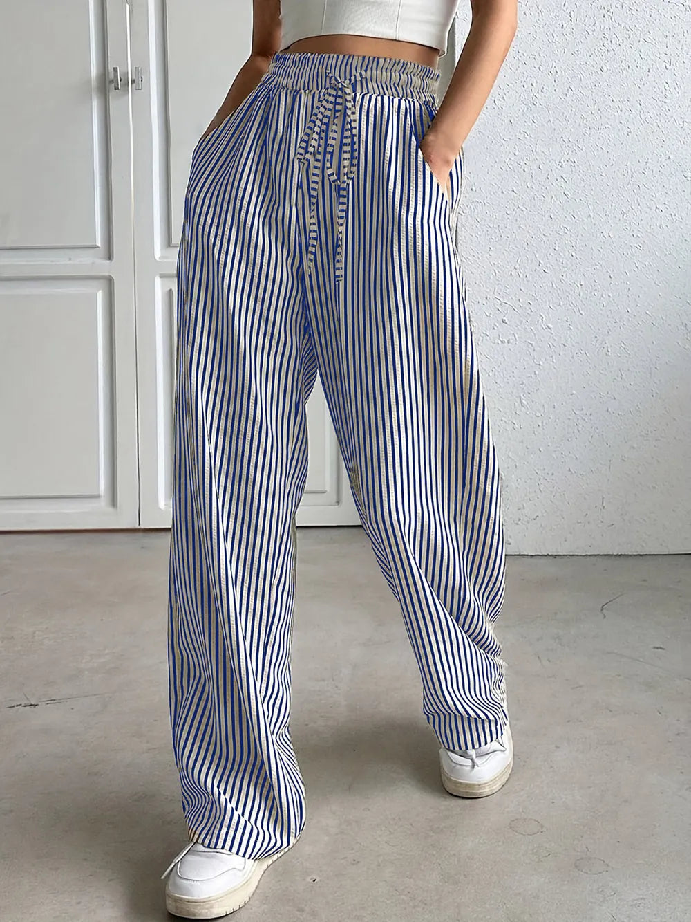 Striped elastic waist drawstring pants in blue and white, full length loose fit
