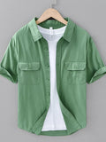 Green men's plus size short-sleeve button-up shirt with two chest pockets
