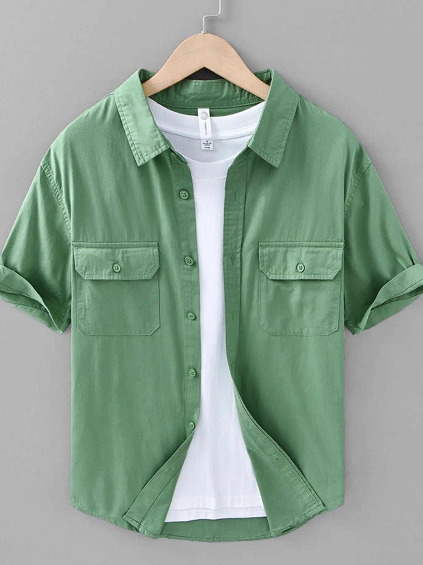 Green men's plus size short-sleeve button-up shirt with two chest pockets