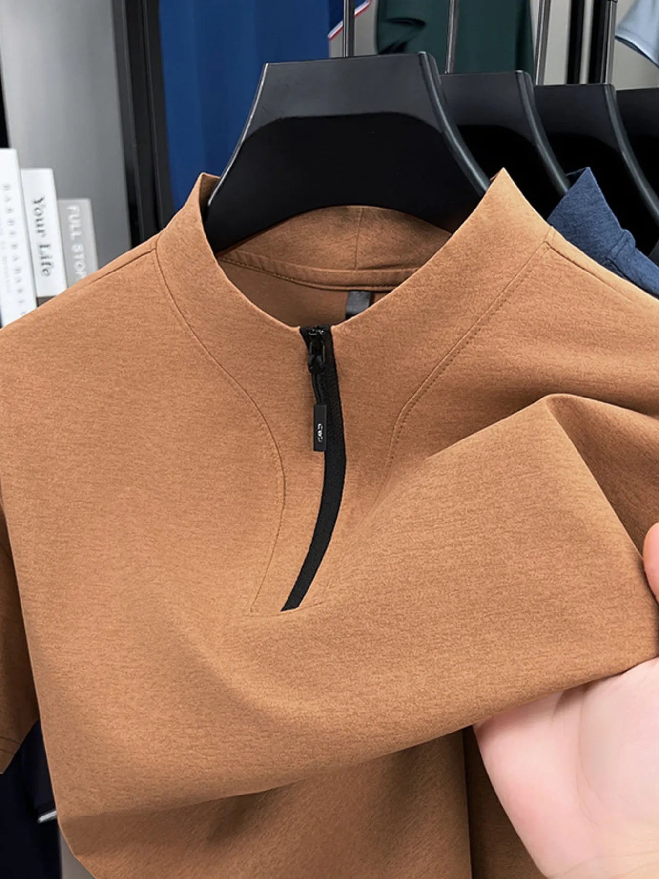 Men's quarter-zip short-sleeve top, tan, front zip placket and shoulder