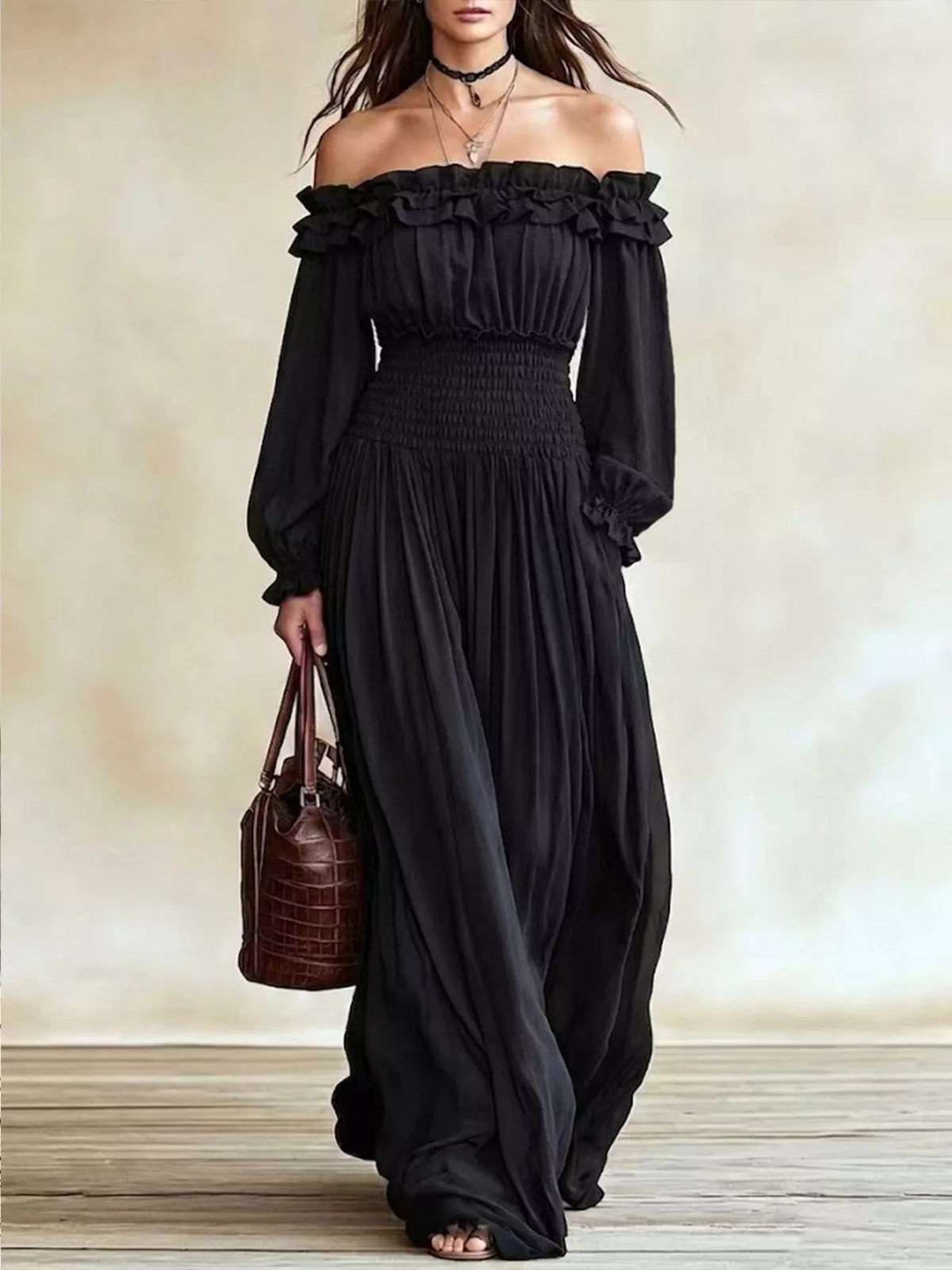 Black off-shoulder ruffled maxi dress with smocked waist and long puff sleeves