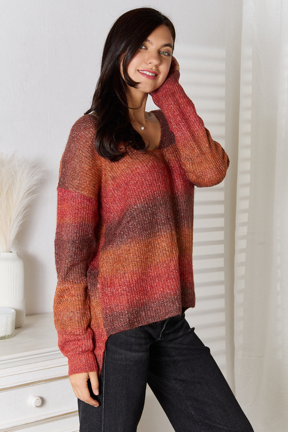 Gradient V-neck knit sweater in brick red to orange, long sleeves