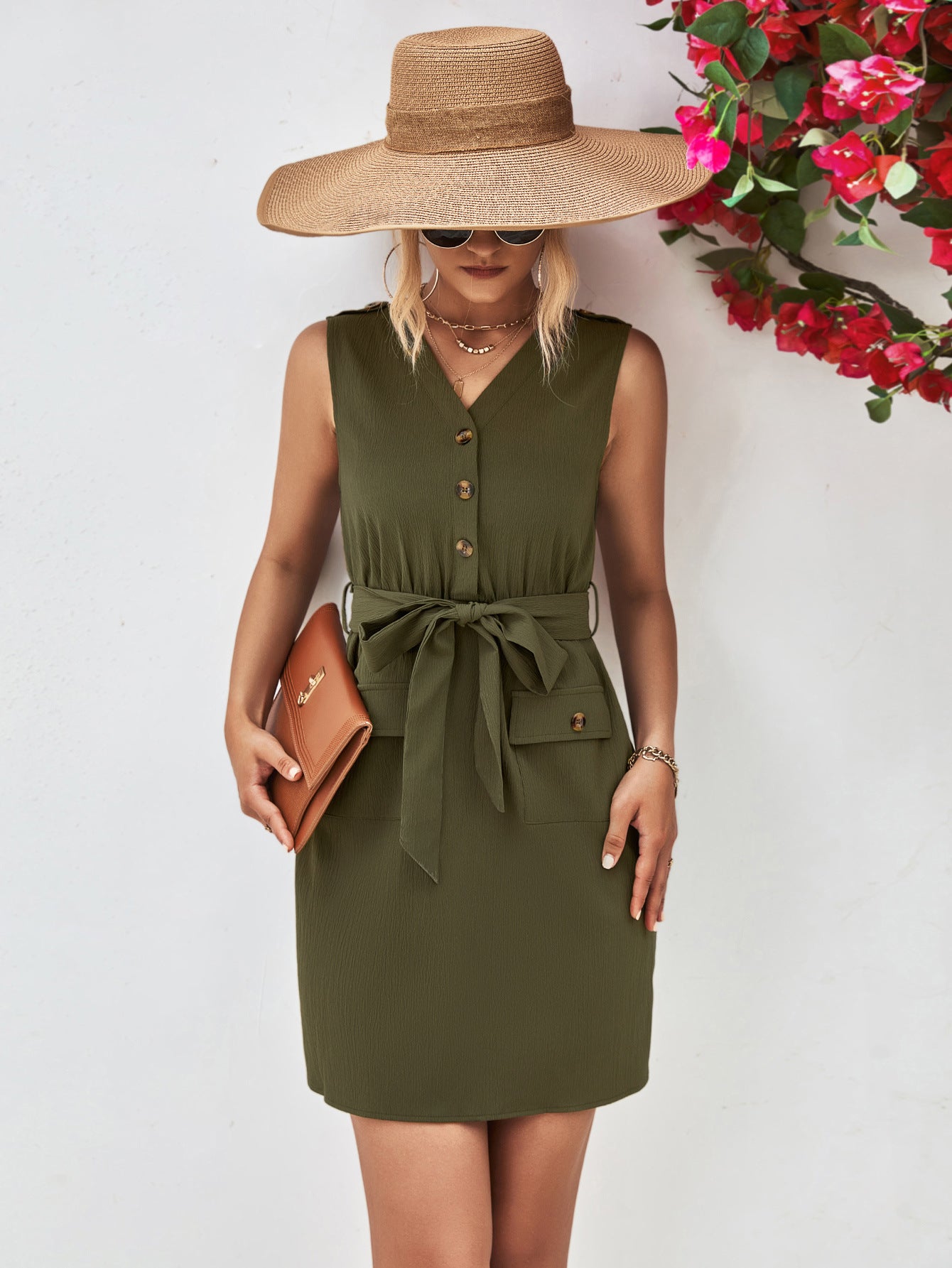 Army green sleeveless V-neck button dress with tied waist belt and flap pockets