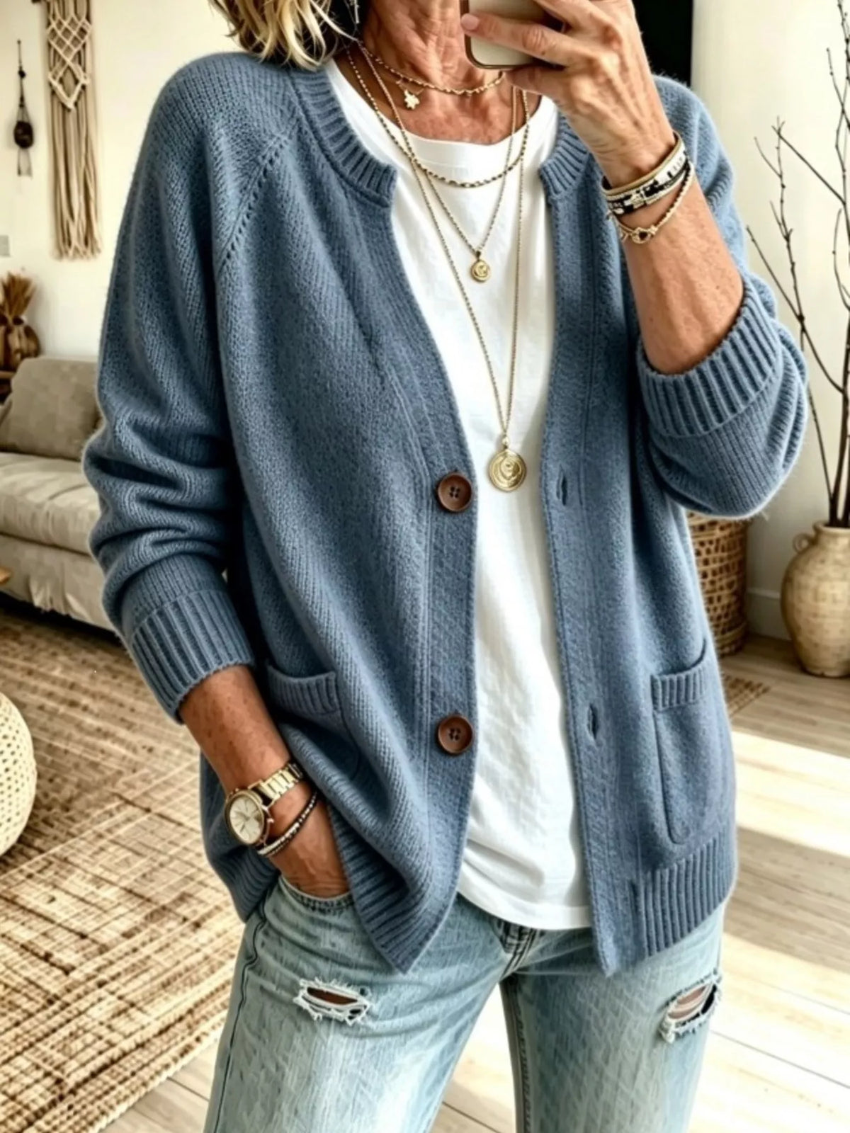 Light blue button-up raglan sleeve cardigan with patch pocket and ribbed knit trim