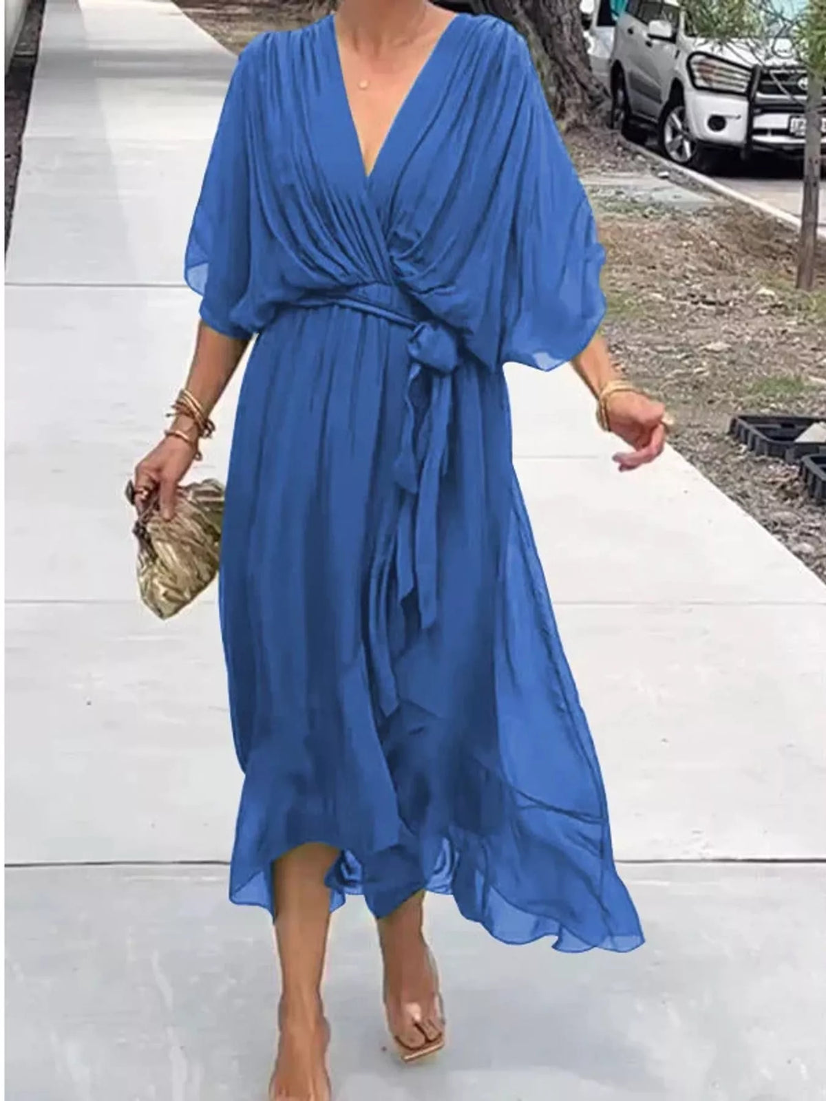 Blue ruched wrap dress with batwing sleeves and waist tie, breezy midi skirt