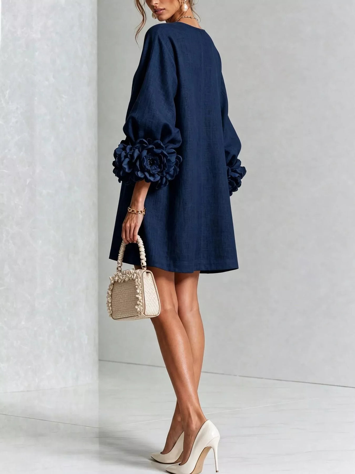 Navy polyester shift dress with round neck and puff sleeves with 3D floral accents