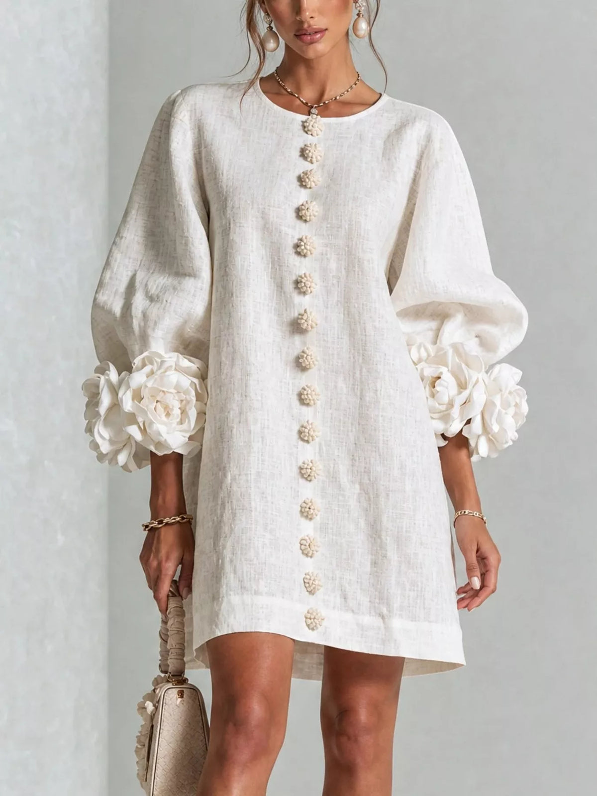Floral applique mini dress with quarter sleeves and front button detail in ivory