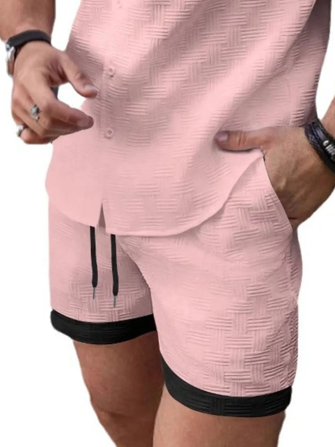 Men's drawstring textured shorts, pale pink with black trim and side slit