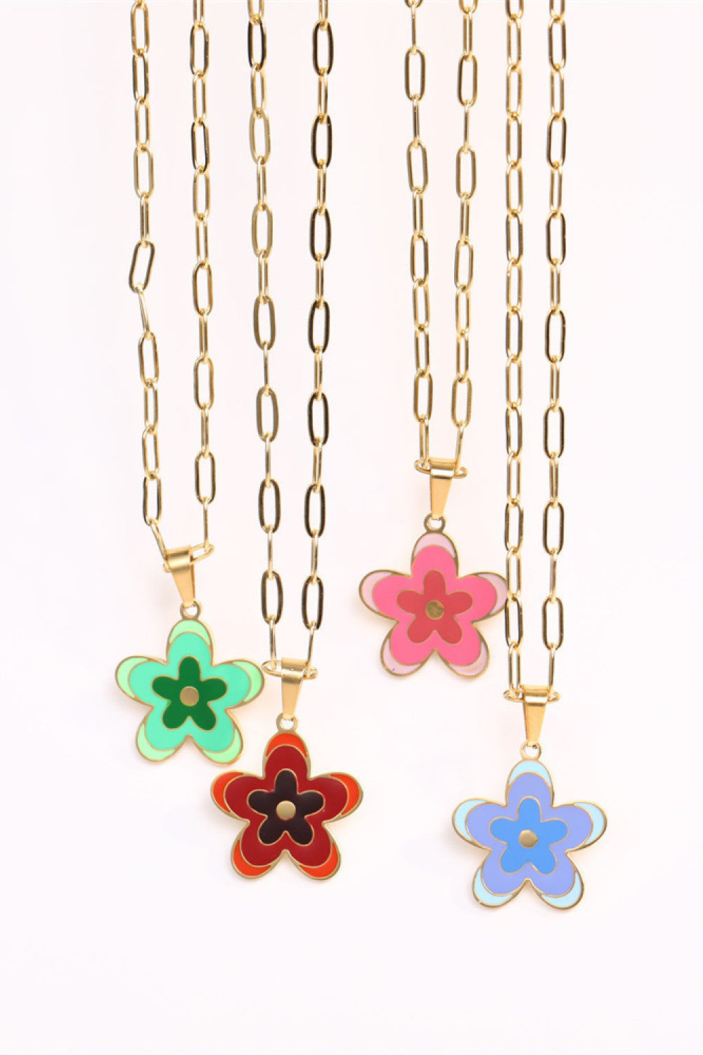 Gold-tone flower pendant necklace with green, red, and pink enamel flower charms