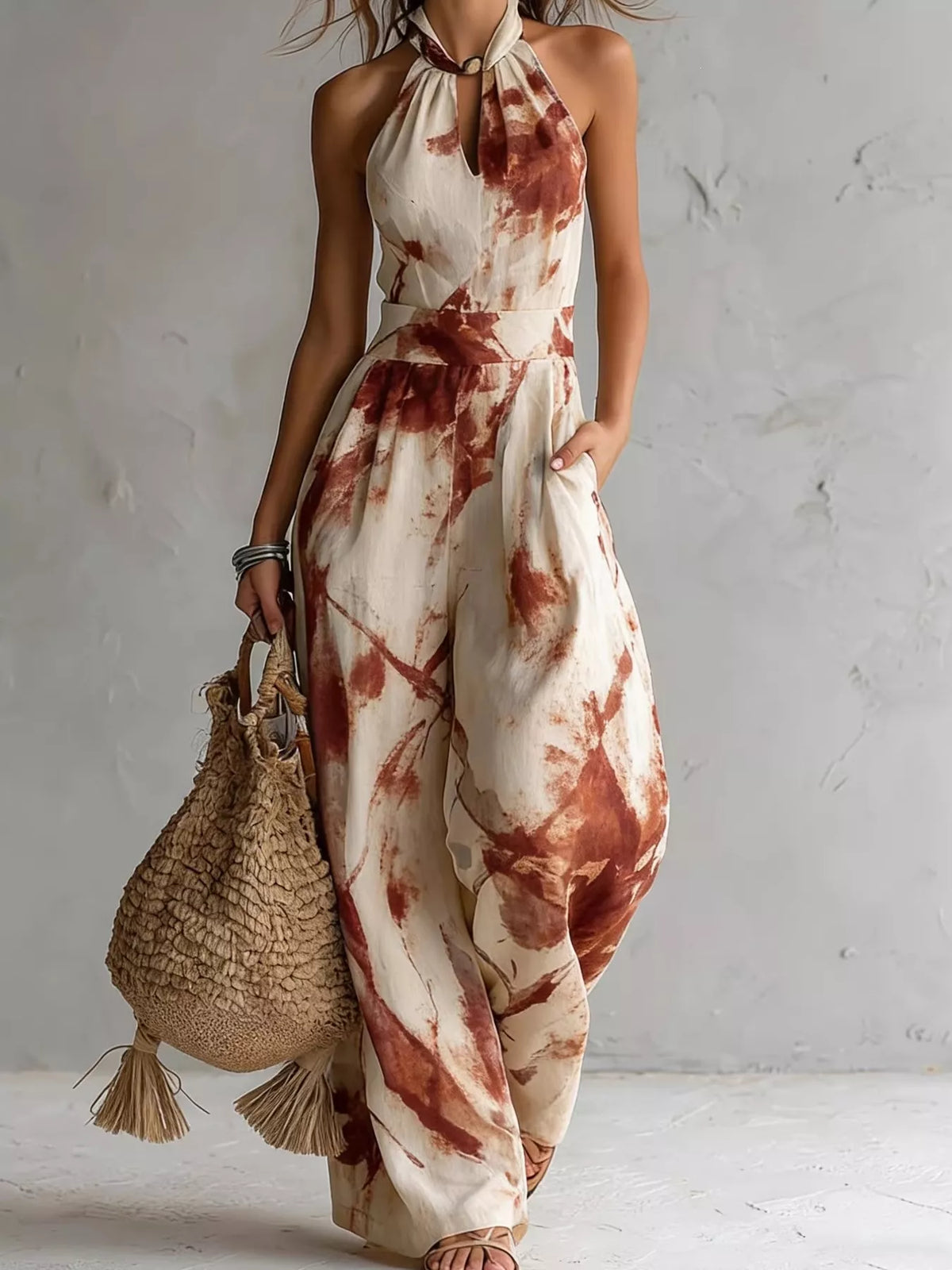 Burnt coral ink-wash halter wide-leg jumpsuit with tie neck and gathered waist
