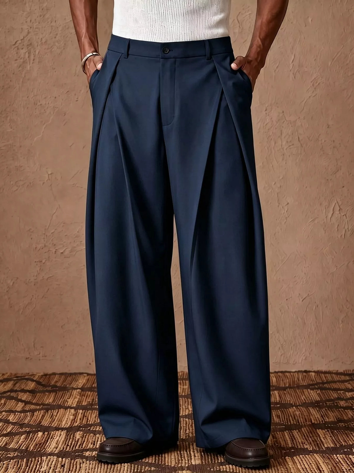 Men's pleated wide-leg high-waist dress pants in navy, pleated front, relaxed fit.