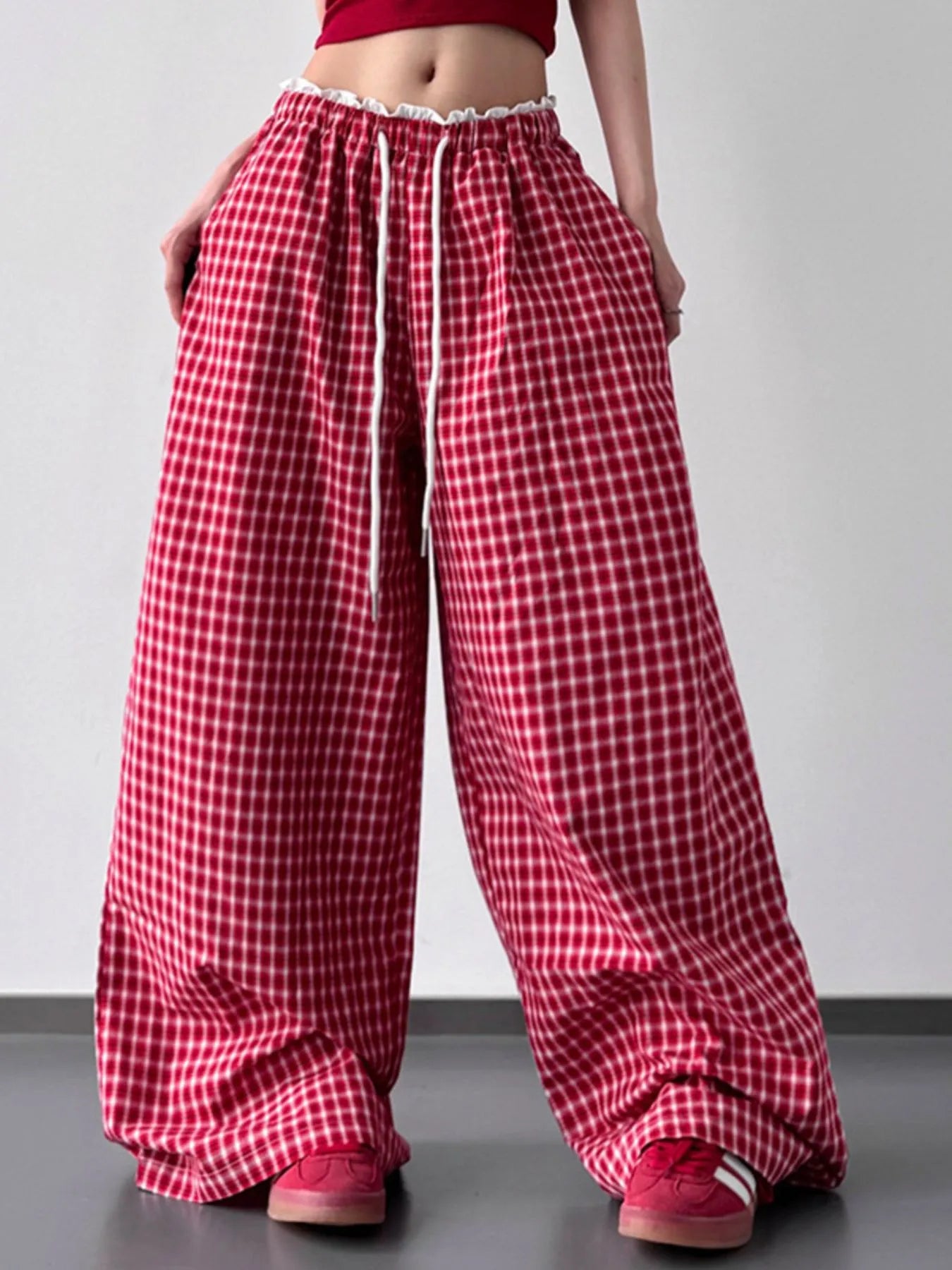 Drawstring plaid wide-leg pants in red and white check, gathered elastic waistband