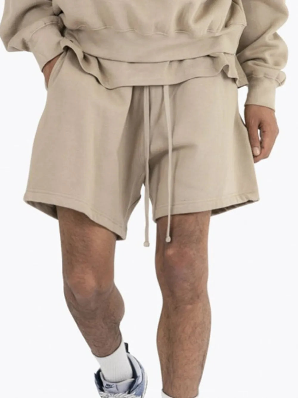 Men's plus size drawstring shorts, beige; side view with drawstring waist
