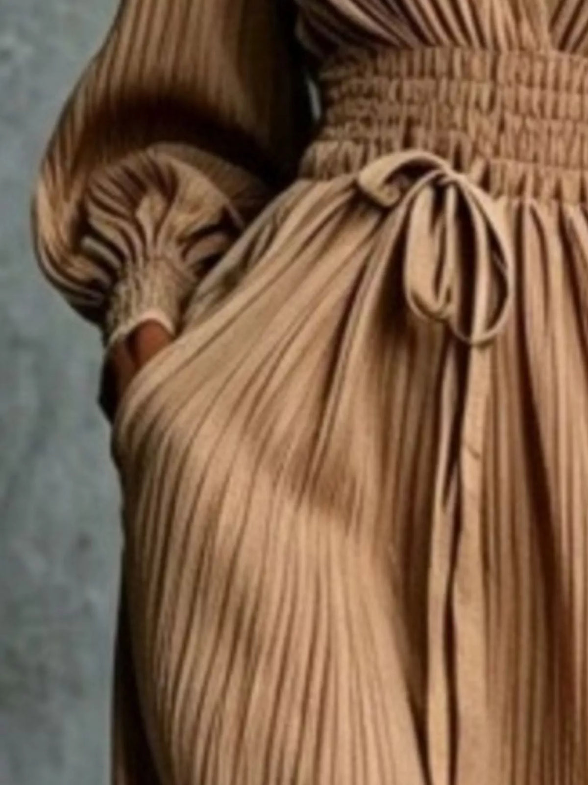 Caramel pleated maxi dress with gathered tie waist and long sleeve detail