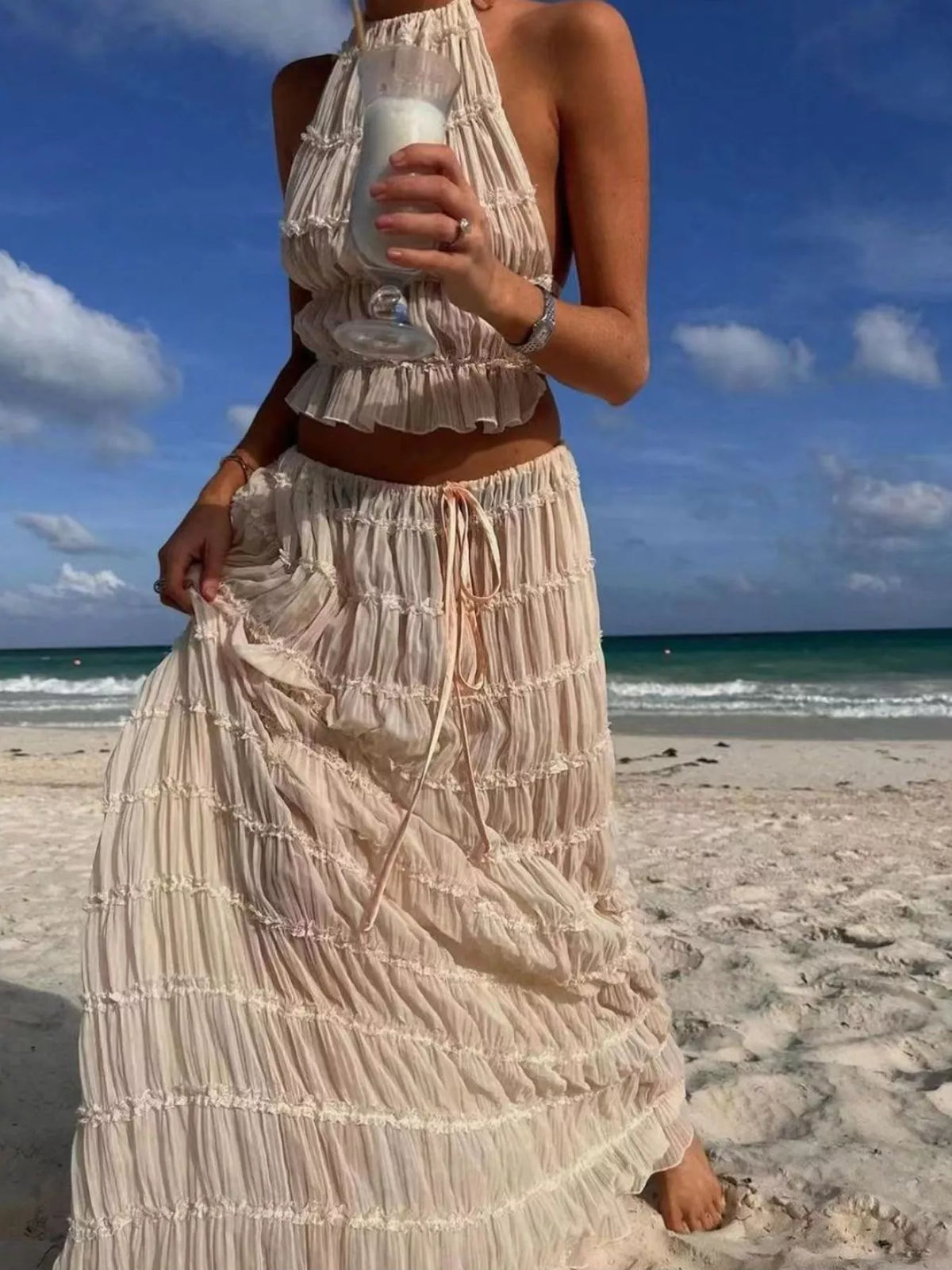Milky white halter crop top with ruffled tiers and matching maxi skirt set