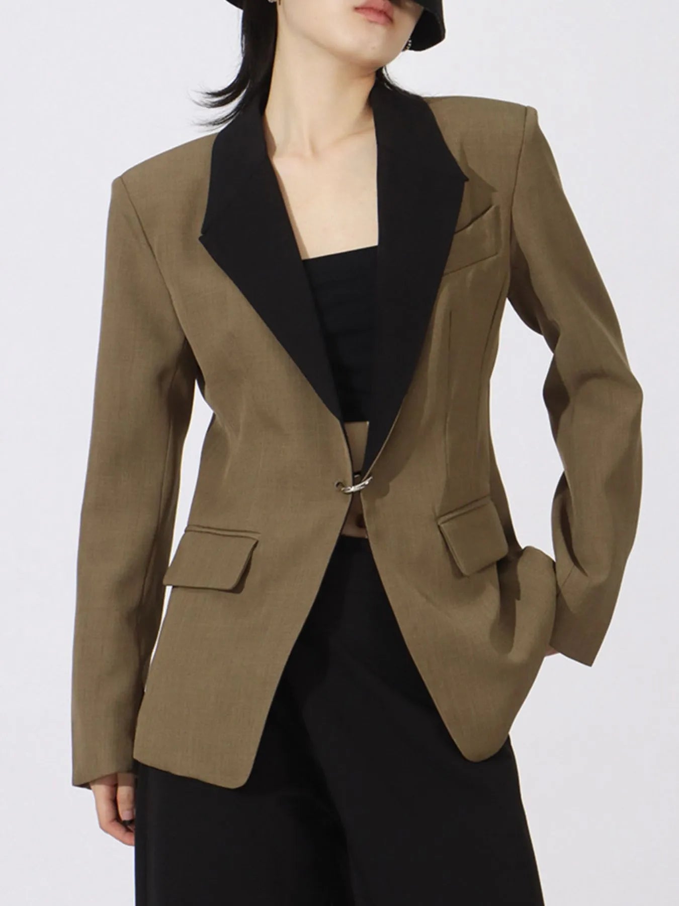 Khaki green long sleeve blazer with black contrast lapels and front hardware closure