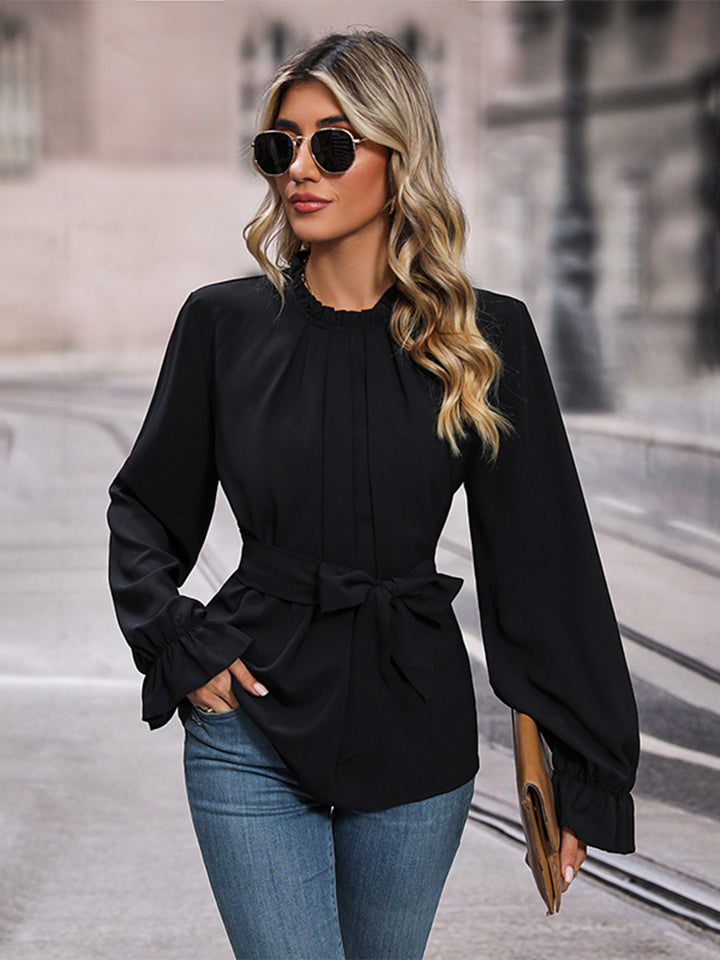 Black round-neck long-sleeve blouse with tie waist and gathered neckline