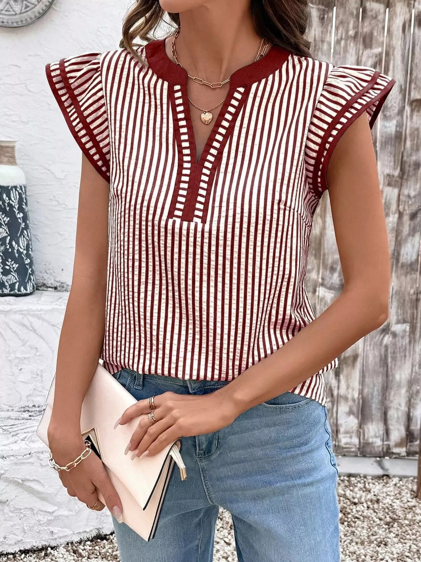 Striped burgundy and white ruffle-sleeve blouse with V-neck