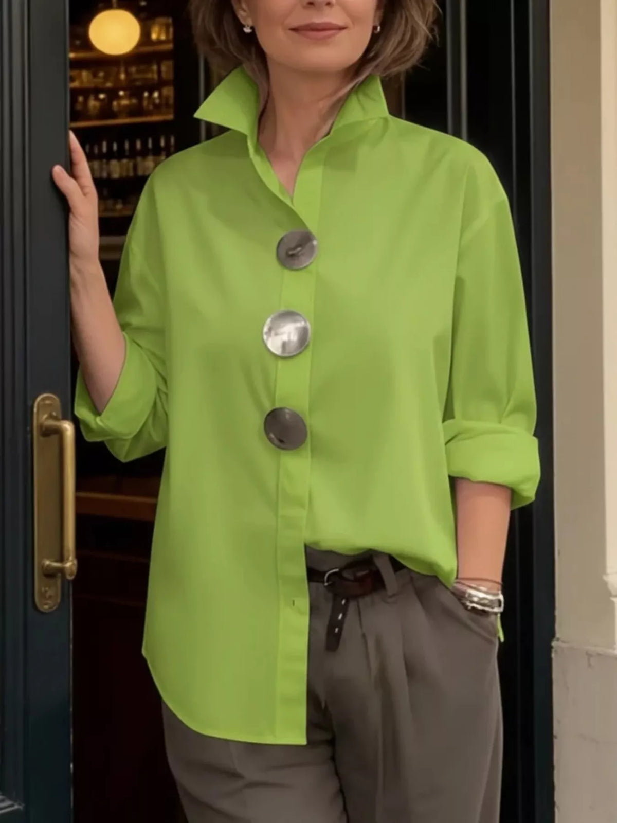 Fluorescent green oversized long-sleeve button shirt with metallic round buttons and collar