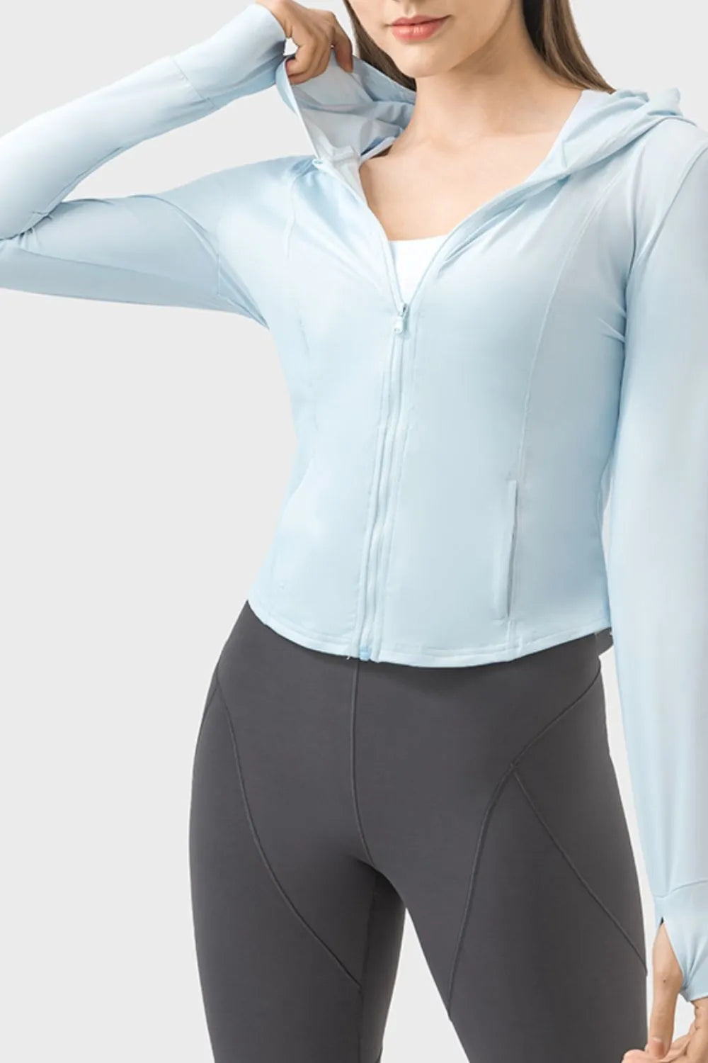 Light blue zip-up hooded long sleeve jacket with front zipper and kangaroo pocket