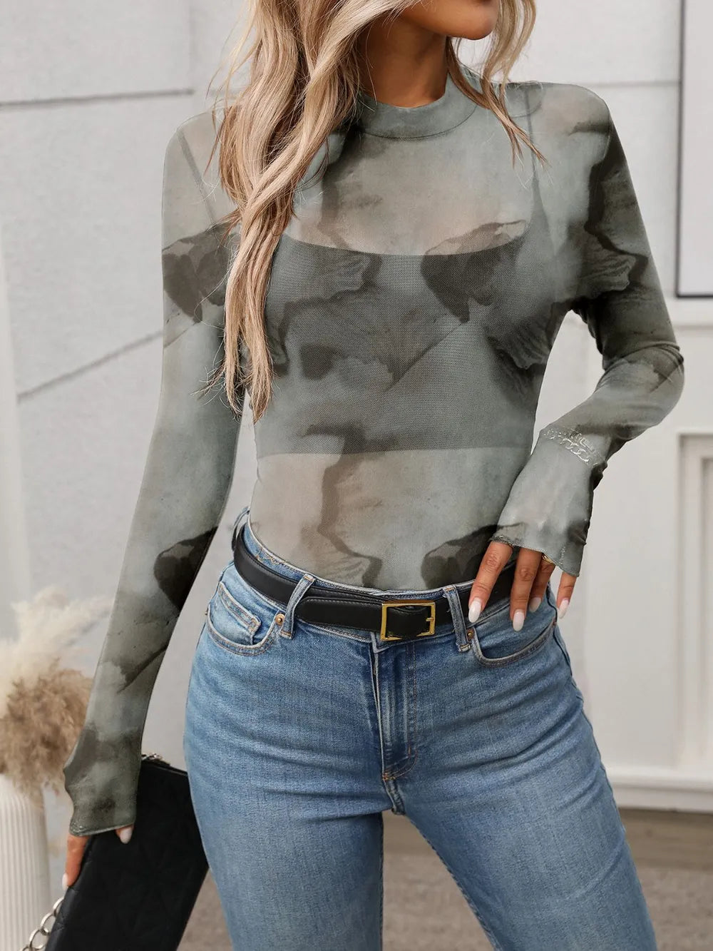 Printed mock neck long sleeve mesh T-shirt with ink-style camouflage-like print.