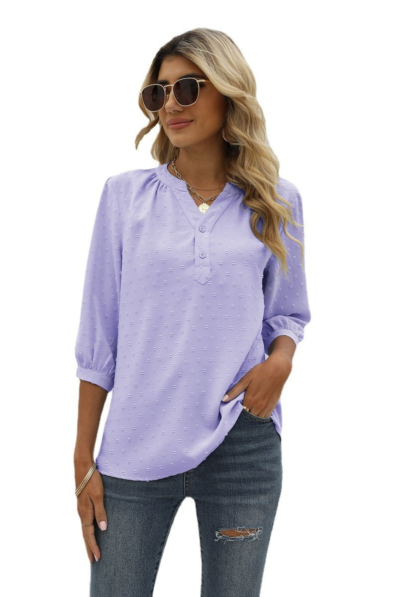 Lavender swiss dot notched-neck blouse with 3/4 sleeves and button placket