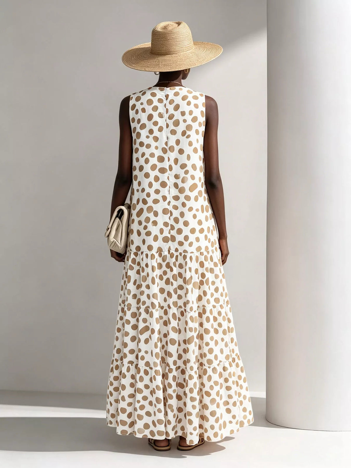 Beige sleeveless tiered maxi dress with polka dots and round neckline