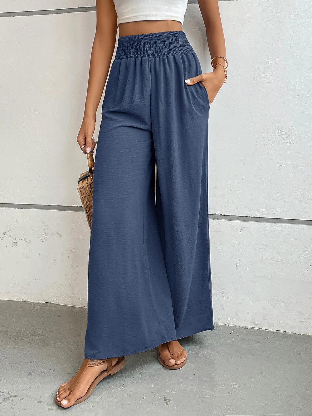 Wide-leg pants in dusty blue with elastic waist and side pockets