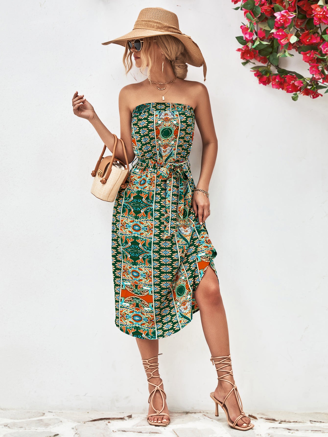 Green strapless tie-belt dress with bold ornamental print, gathered waist, midi length